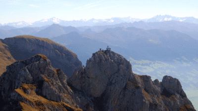 Kletterer am Gipfel des Rosskopf