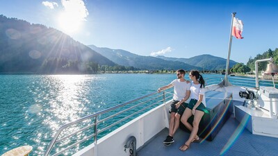 Enjoying the warm rays of sunshine on the Achensee shipping boats. Shortly after the Scholastika landing stage in Achenkirch.